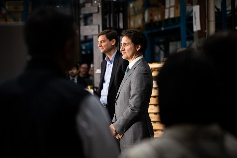 PM Trudeau and Premier David Eby posing for photos