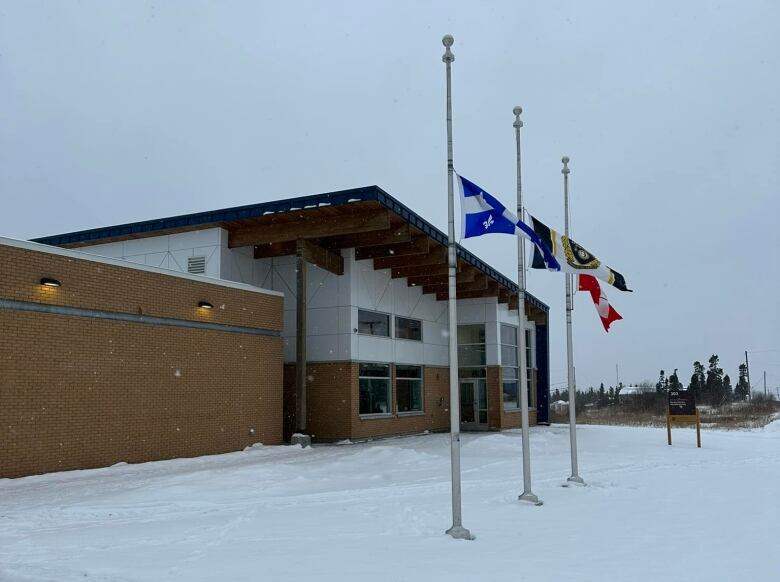 Flags fly at half mast