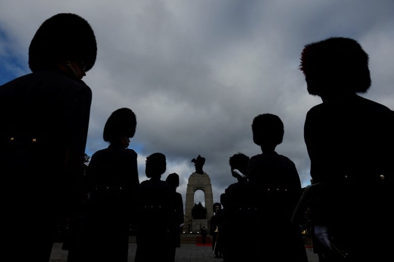 Members of the Central Band of the Canadian Armed Forces take part in a ceremony at the National War Memorial on Remembrance Day in Ottawa.