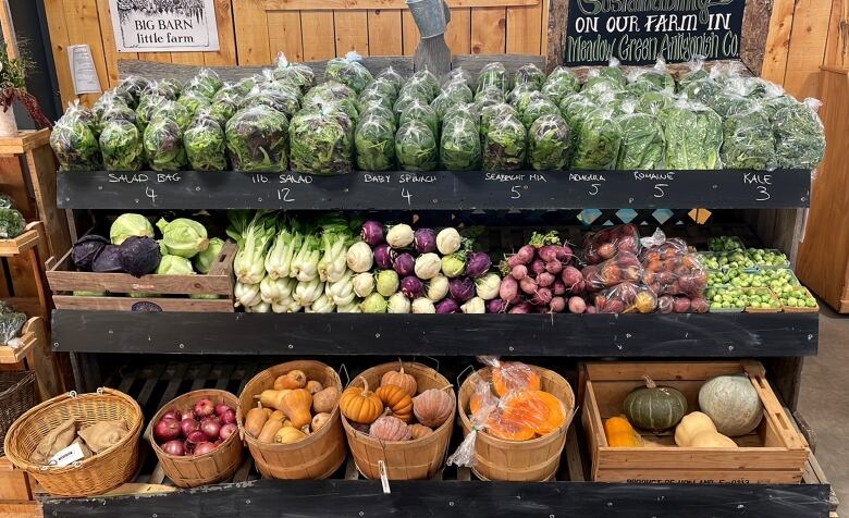 Vegetables for sale in a display case.