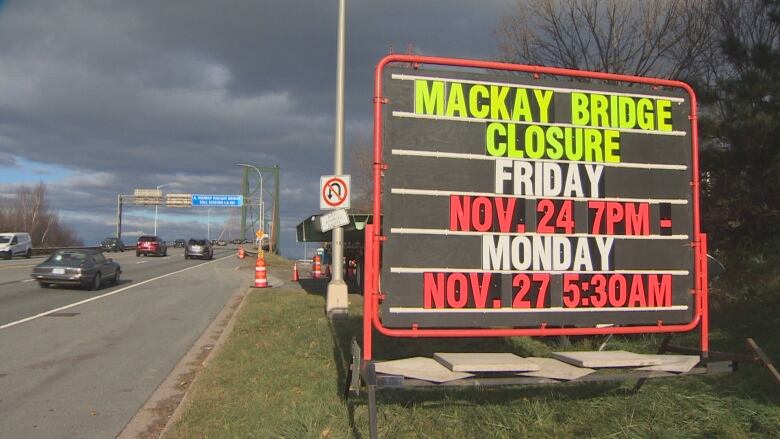 A sign lists closure hours for the MacKay Bridge in Halifax.