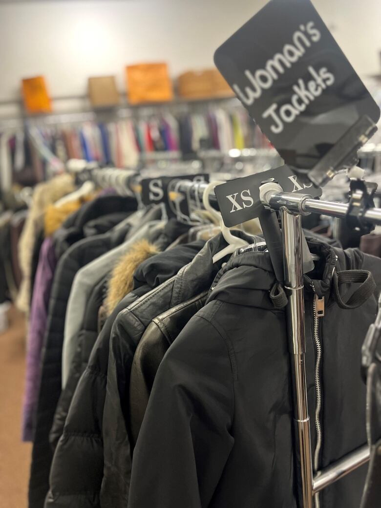 Jackets are pictured on a rack. Haven on the Queensway offers seasonal clothing free of charge for individuals and families going through a crisis, but director of operations Aretha Khaloo says the charity is struggling to keep up with demand.