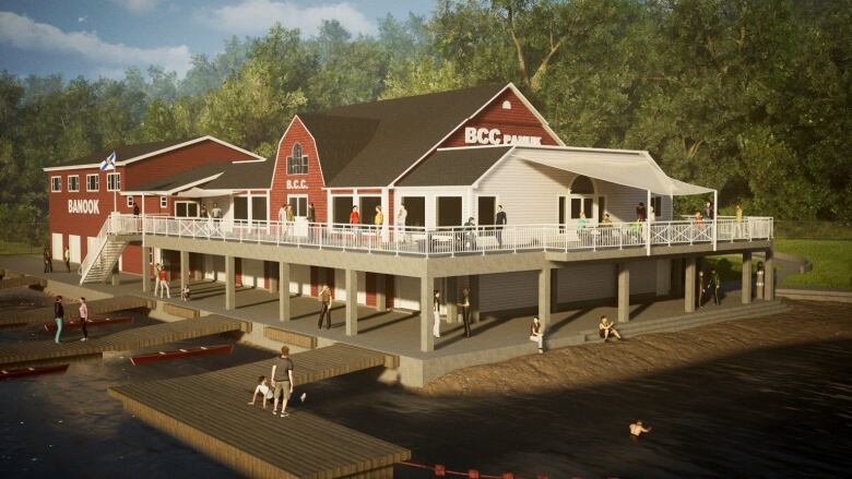 a red house-like building with docks at a lake.