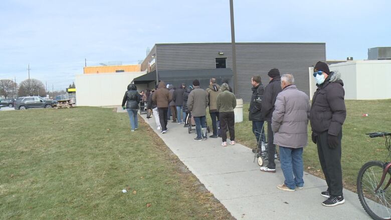 People lining up at a Windsor, Ont., food bank.