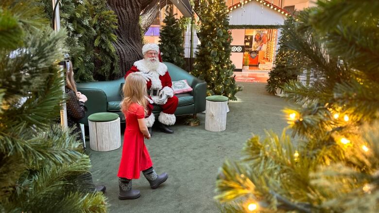 Special arrangements were made at the Southcentre Mall on Sunday, inlcuding softened lighting, to give children with sensory sensitivities a chance to take Santa photos in a welcoming environment. 