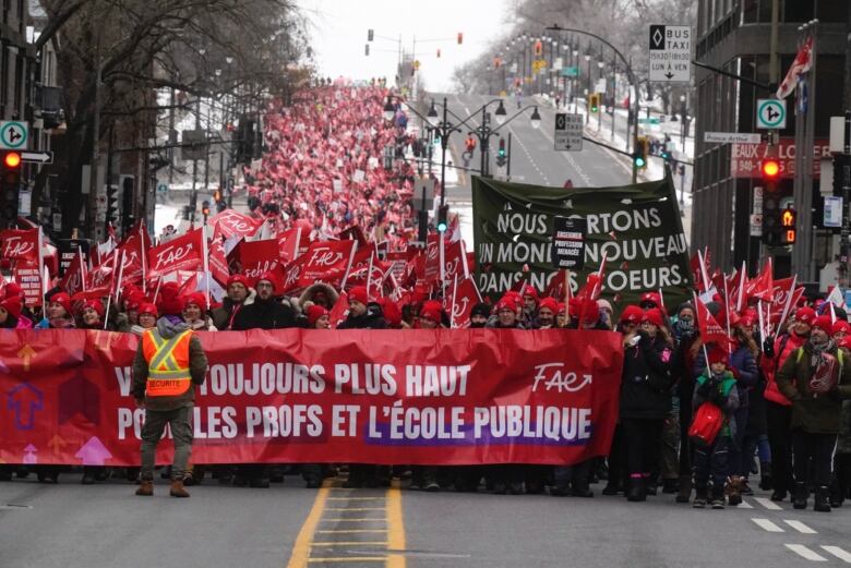 FEA members pack one side of multi-lane street in Montreal on Dec. 12, 2023.