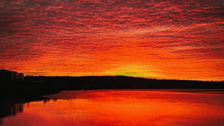 Bright sunrise with yellow and red sky