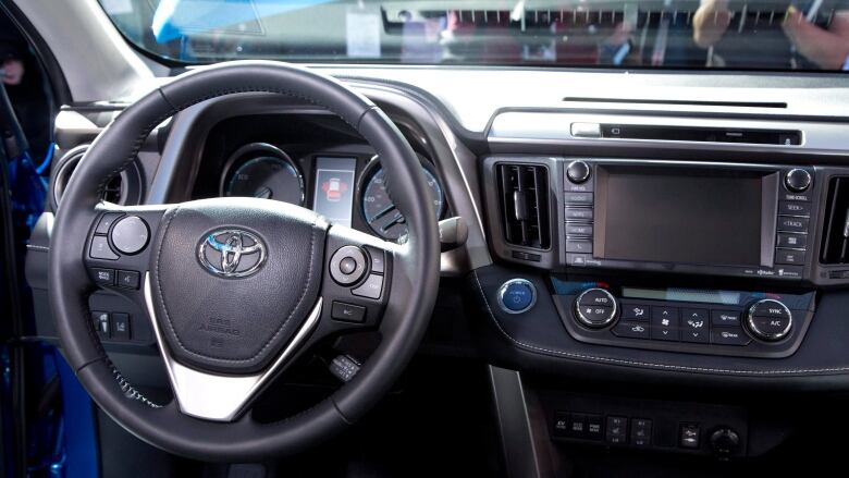 A RAV4 Hybrid steering wheel.