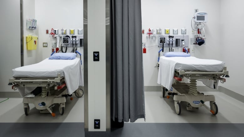 Two beds in a hospital emergency department