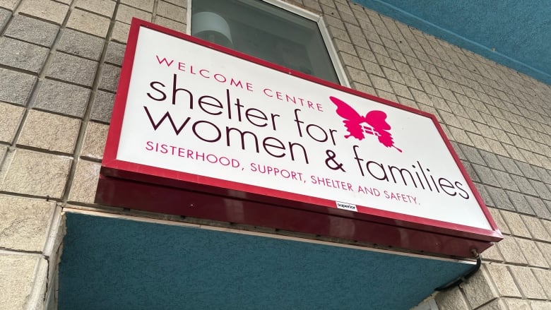 A sign reads Welcome Centre Shelter for Women and Families.