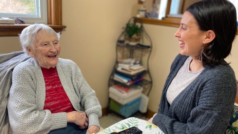 Gaelic fieldworker, Amber Buchanan interviewing Gaelic speaker, Jean MacKay as part of research organized by the Highland Village Museum. 