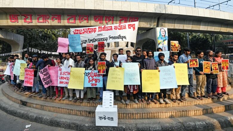 Dhaka University students rally to urge people to boycott Bangladesh's pending general election.