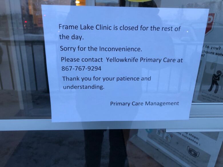 A sign on glass.