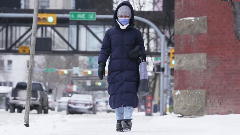 A woman wearing a winter coat.