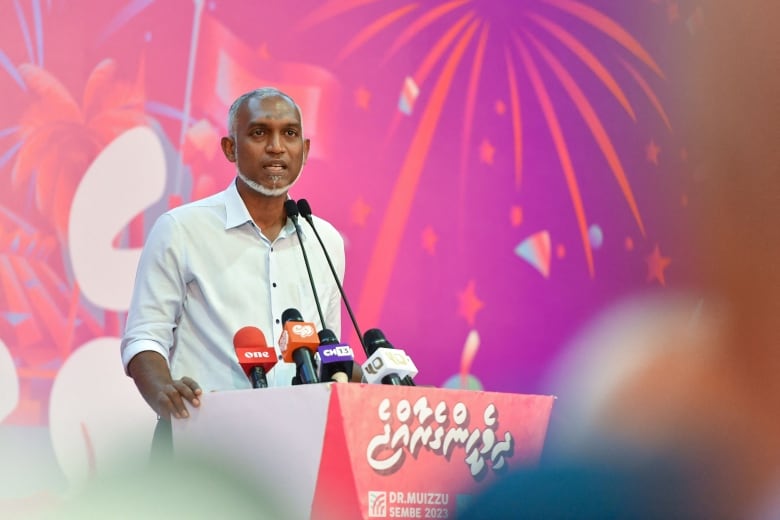 The president of the Maldives, Mohamed Muizzu, delivers a speech to supporters after he won the September election but before he was officially sworn in.  