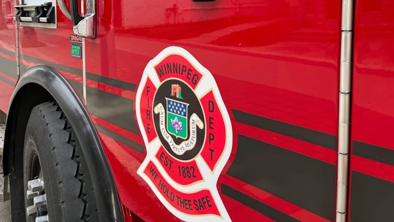 Close up of the door of a red fire truck