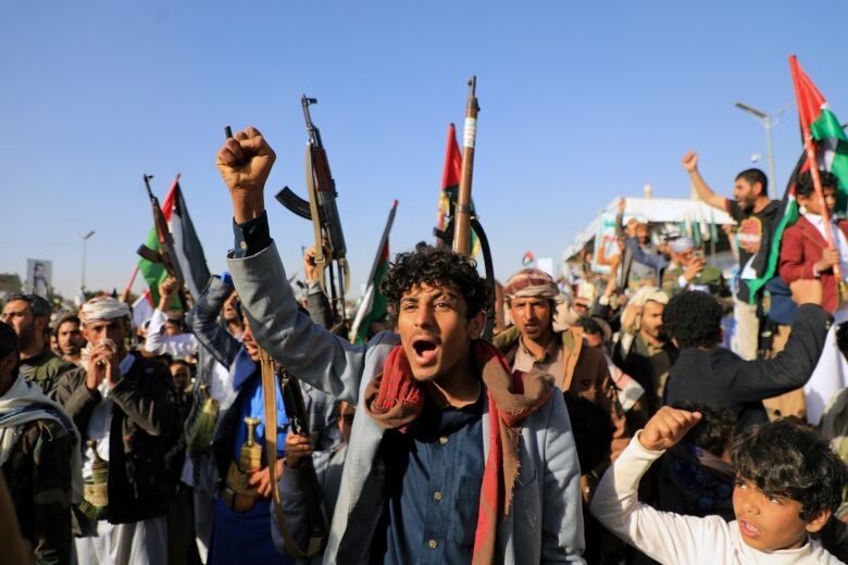 Yemeni demonstrators gather at a protests in the wake of U.S. and British airstrikes on Houthi-related targets.