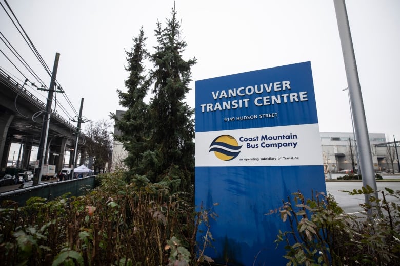 Picketers are pictured outside of the Coast Mountain Bus Company Vancouver Transit Centre in Vancouver, British Columbia on Tuesday, January 23, 2024. See Transit Centre sign.