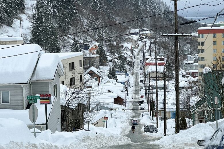 A view of a snowy city street.