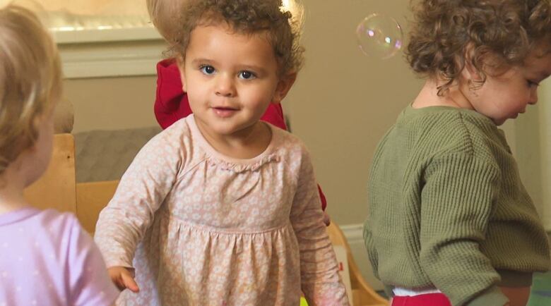 Children playing with bubbles.