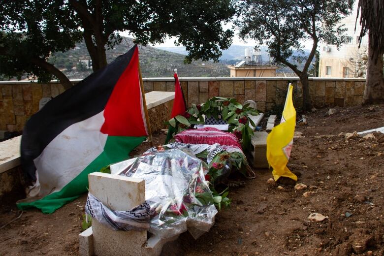 The grave of Tawfic Abdel Jabbar,  on a hillside not far from where he was slain by a group of Israeli men.  Police say they are investigating by have made no arrests.