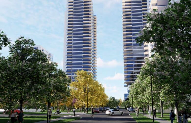 People walk down a street and through a square with greenery as two tall silver and blue towers rise above the street