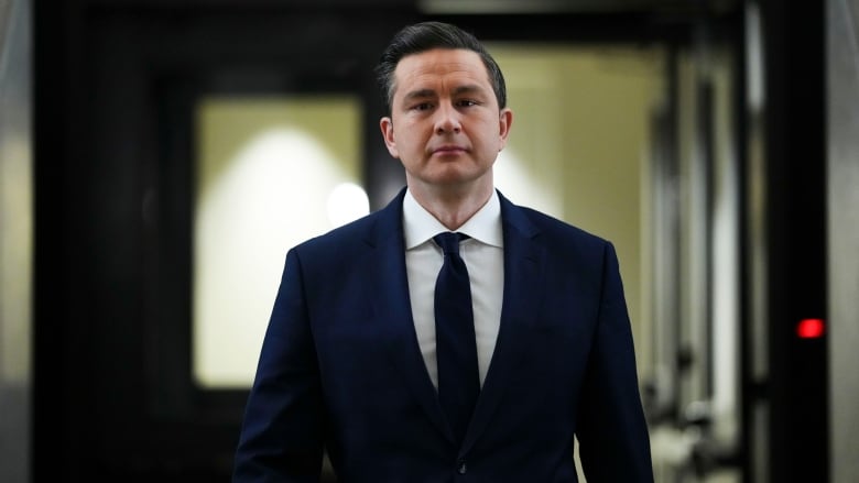 Conservative Leader Pierre Poilievre arrives to a caucus meeting on Parliament Hill in Ottawa