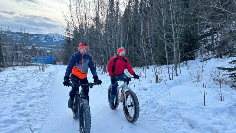 Harri Vaarala, left, and Pekka Tahkola, right, explore Whitehorse's multi-use paths. 