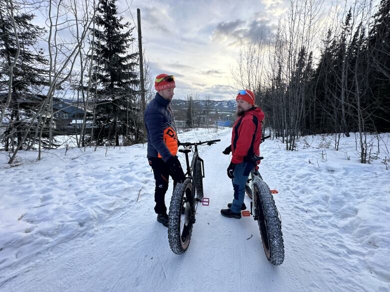 Harri Vaarala, left, and Pekka Tahkola, right, explore Whitehorse's multi-use paths.