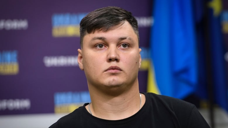 Maxim Kuzminov, a Russian pilot who defected to Ukraine, is seen in a file taken at a press conference in Kyiv in September 2023. Kuzmiov is reported to be the victim of a homicide in Spain.