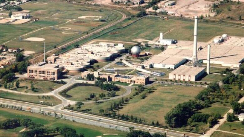 An aerial photo shows a large industrial facility.