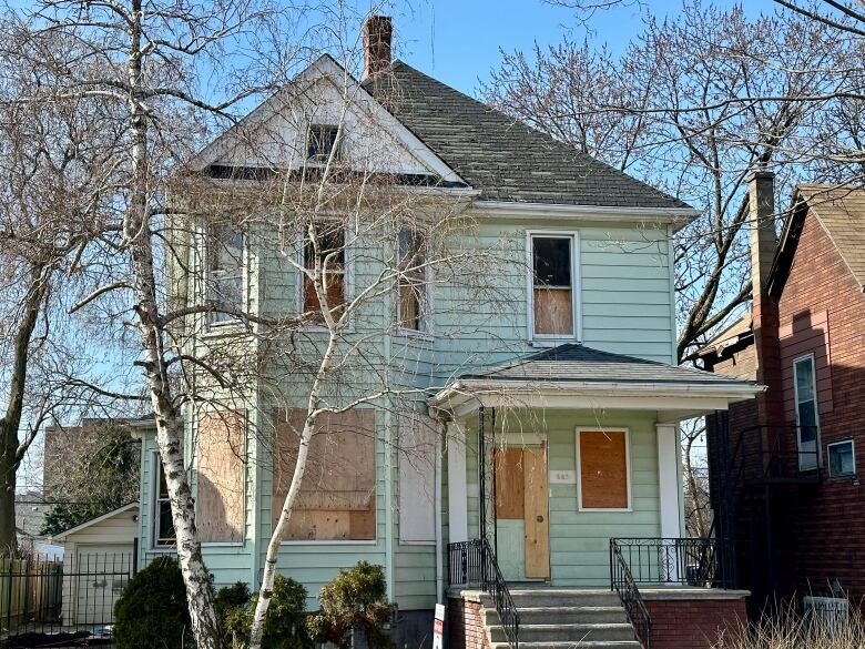 A large house in disrepair.