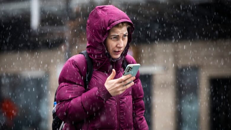 woman in purple jacket 