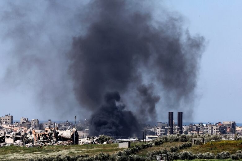 Smoke billows over the Gaza Strip amid Israeli bombardment on Thursday, Feb. 29, 2024.