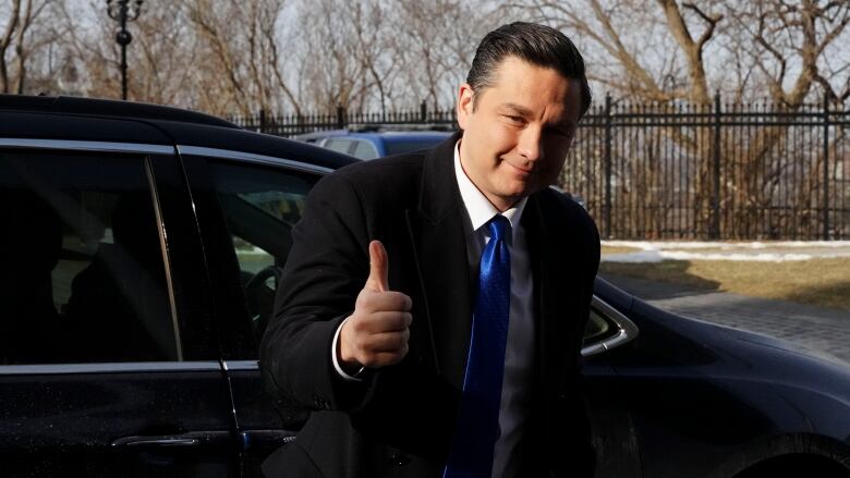 Conservative Leader Pierre Poilievre arrives to Parliament Hill in Ottawa.