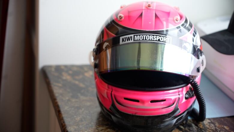 Pictured is Havrda's pink racing helmet. 