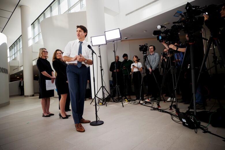 Prime Minister Justin Trudeau speaks beside Deputy Prime Minister Chrystia Freeland, during an announcement at Womens College Hospital, in Toronto, Thursday, March 7, 2024.