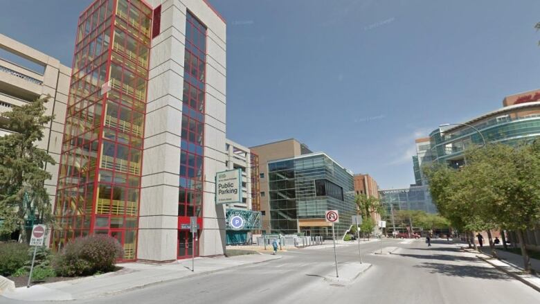 Buildings line an empty street.