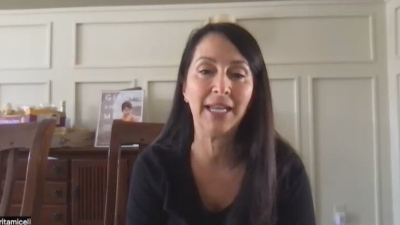 A woman speaks in a Zoom interview.