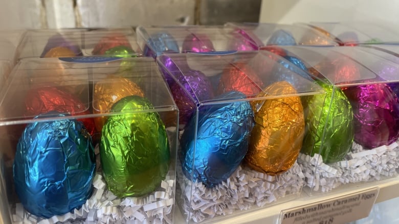 An assortment of Easter eggs in colourful foil wrapping.