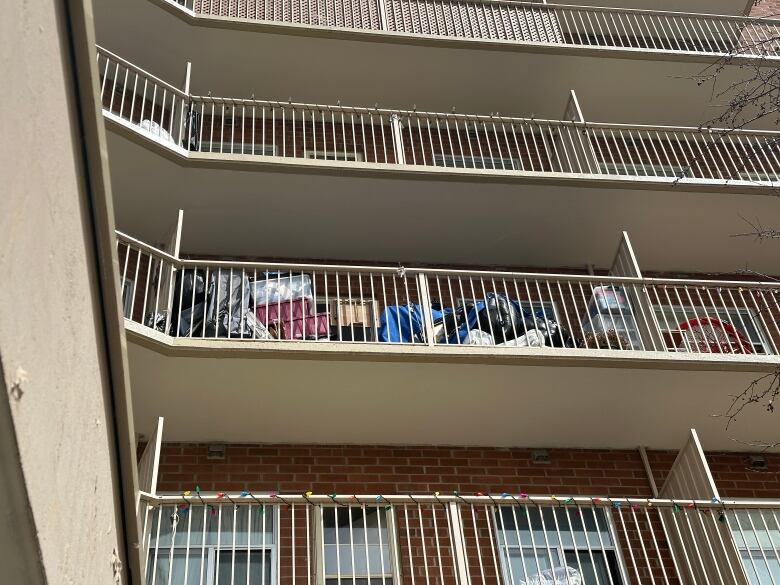 Leese says some of her neighbours at this Huron Heights apartment complex have put their belongings out on their balconies to allow easier access for pest control to spray their units. 