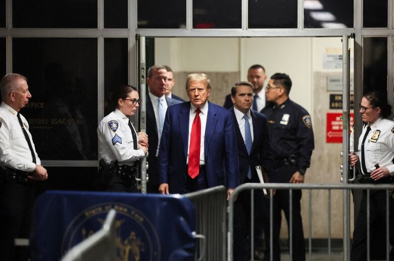 Trump talking in hallway 