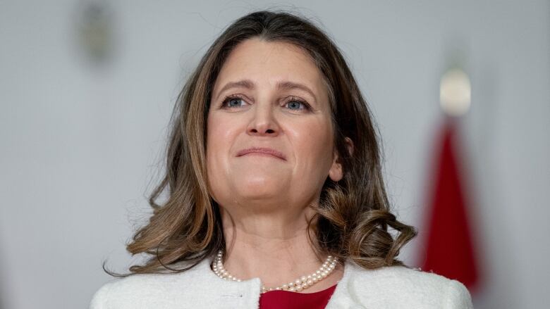 Deputy Prime Minister and Minister of Finance, Chrystia Freeland listens to a speaker during a news conference for a housing announcement in Vancouver, B.C., Wednesday, March 27, 2024.