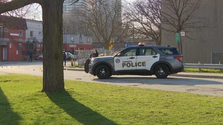 A police car on a road.