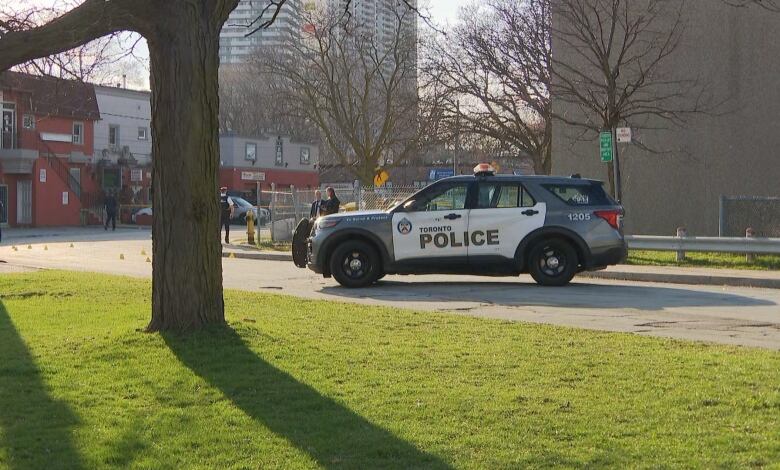 A police car on a road.