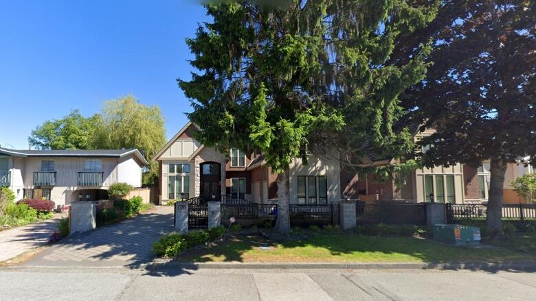 A home on a leafy street.