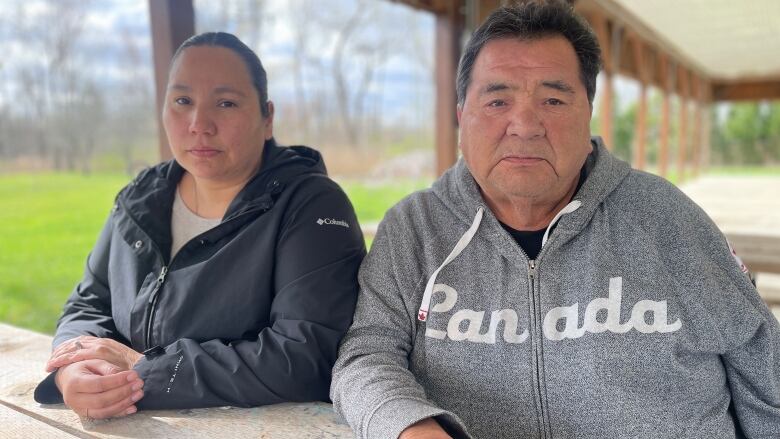 Christine Rogers (left), her father Bobby, and daughter went to hospital earlier this week with symptoms of sore throats, nausea and headaches.