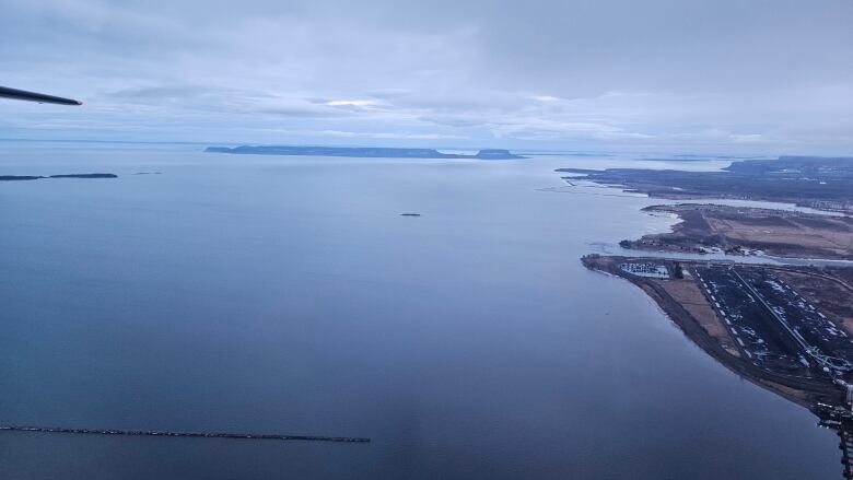 An aerial view of a large body of water, seen from a plane.