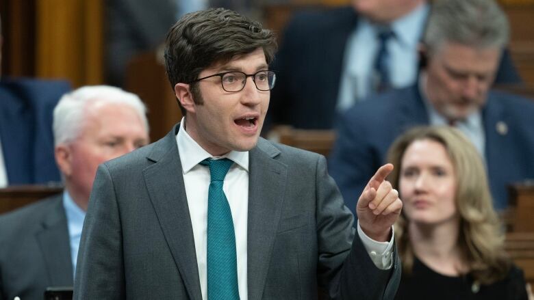 Conservative MP for Sherwood Park-Fort Saskatchewan Garnett Genuis rises during Question Period, in Ottawa, Monday, April 15, 2024. 