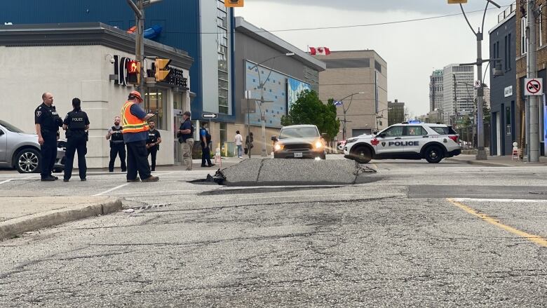 A big piece of pavement and police officers